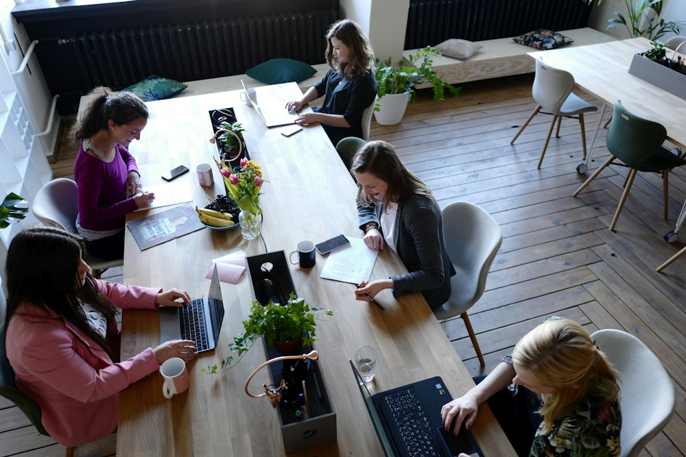 Overhead view of a team working at a shared table