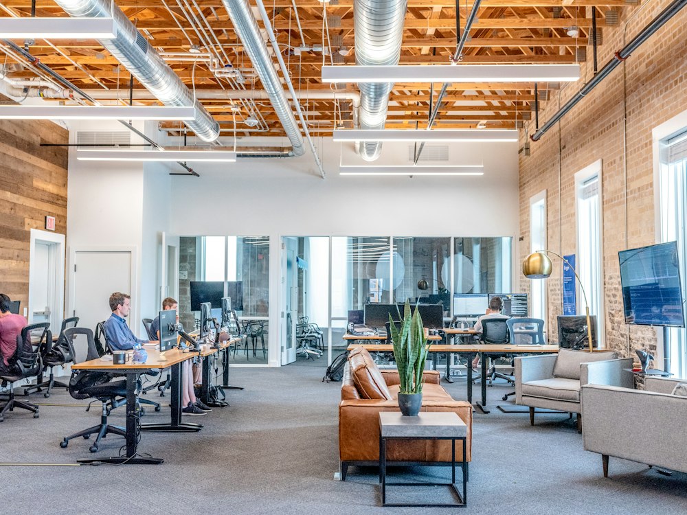 Bright open office with teams collaborating